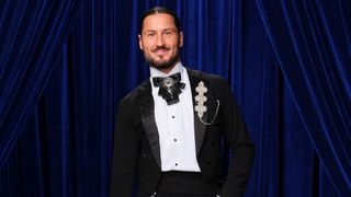 DWTS pro dancer Val Chmerkovskiy in a promo shot for Season 35 with a slight smile.