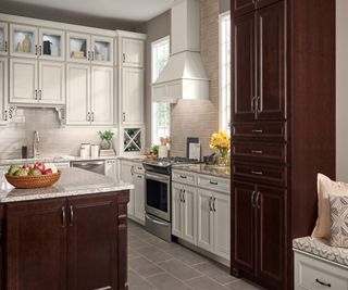 Ornate white painted ktichen cabinets in a traditional kitchen