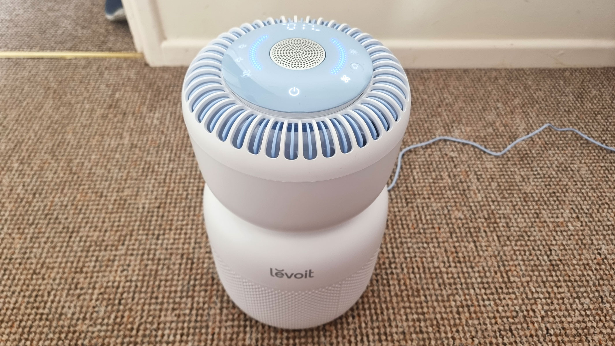 Levoit Sprout air purifier being tested by our reviewer