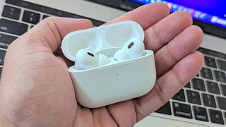 Apple AirPods Pro 2 head in hand