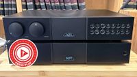 Naim separates on stand with Press Play logo