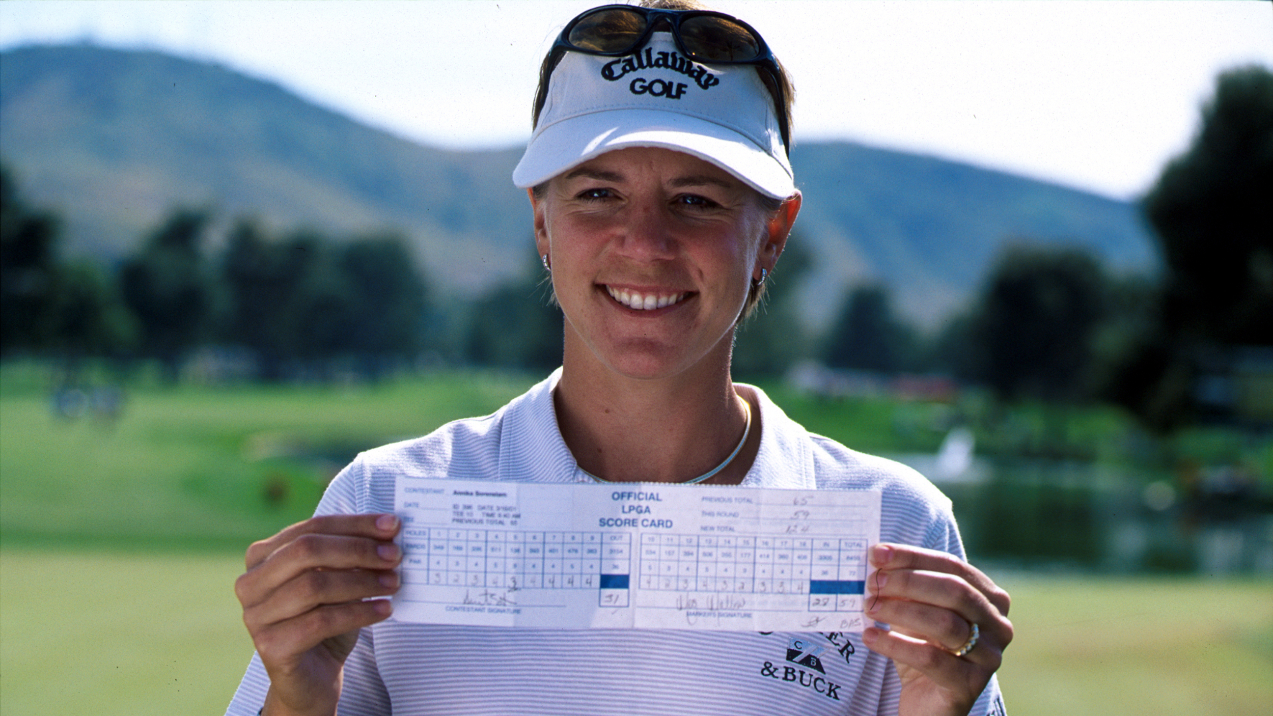 Annika Sorenstam with her scorecard for her 59