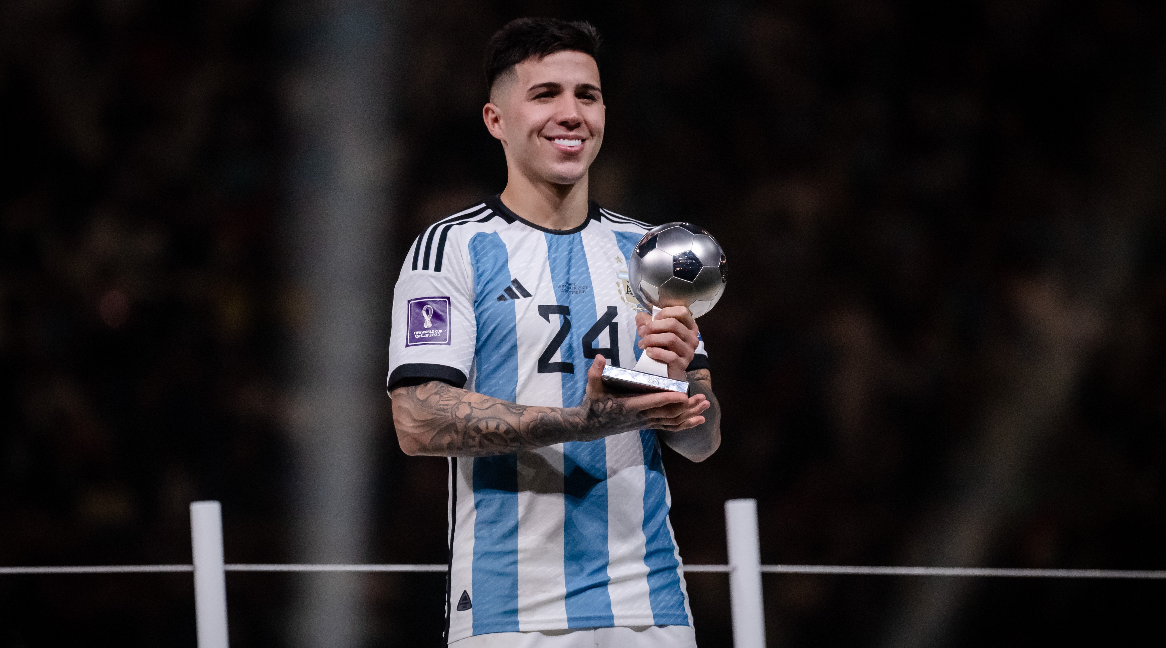 Enzo Fernandez of Argentina holds the trophy for Best Young Player after Argentina beat France in the final of the FIFA World Cup 2022 on 18 December, 2022 at the Lusail Stadium in Lusail, Qatar.