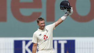 England’s Joe Root celebrates his double century against India