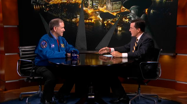 TV comedian Stephen Colbert discusses NASA&#039;s Mars rover Curiosity landing with astronaut John Grunsfeld, NASA&#039;s associate administrator for science missions, on Aug. 1, 2012.