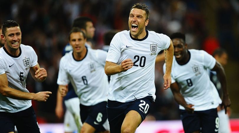 Rickie Lambert celebrates after scoring against Scotland