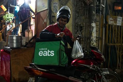 An Indian Uber Eats delivery driver