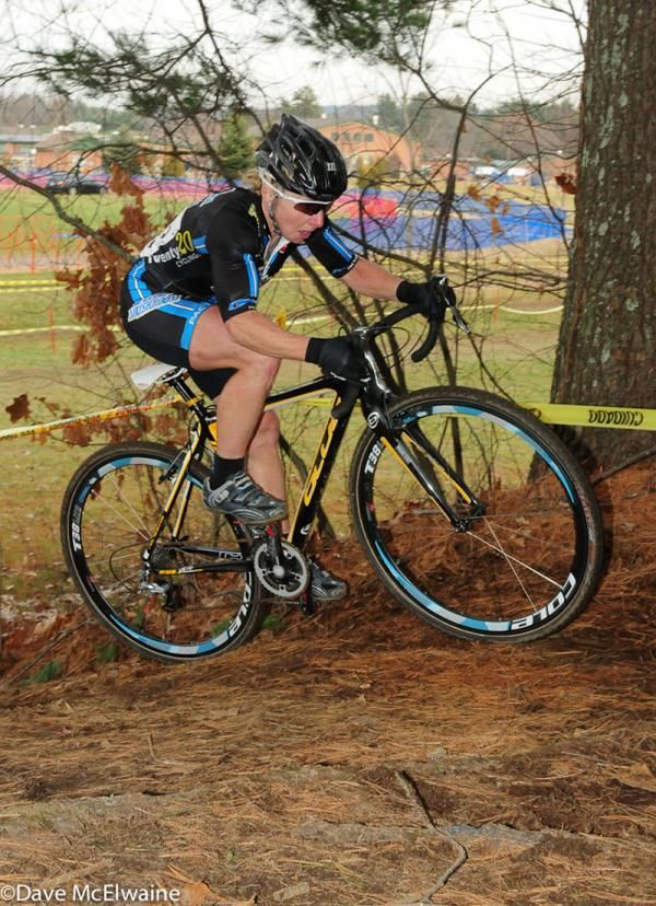 Laura Van Gilder (C3/Mellow Mushroom Pizza) entering the woods with the lead