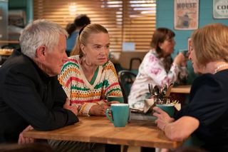 Bianca Jackson talks to Hugh and Brenda in the cafe