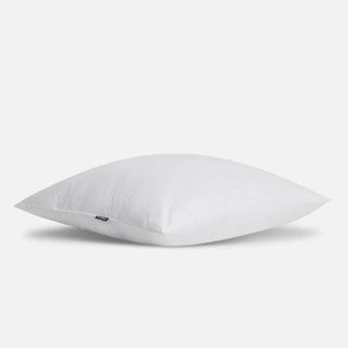 Brooklinen Down Alternative Pillow against a white background.