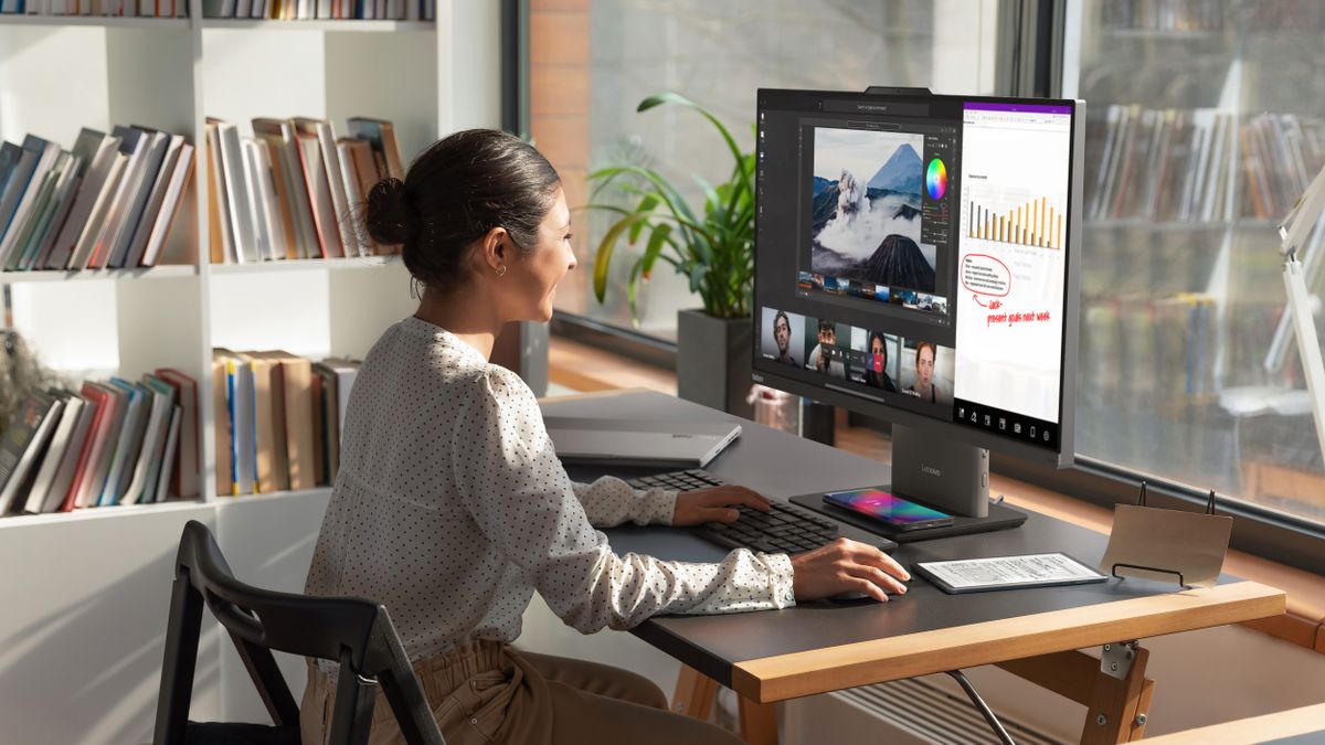 Lenovo&#039;s ThinkCentre Neo 50a and wireless charging stand in situ