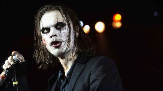 HIM’s Ville Valo dressed as The Crow onstage in London