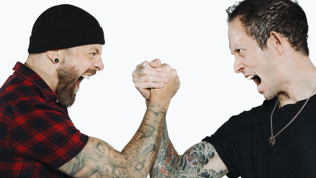 Matt Heafy and Matt Tuck high fiving