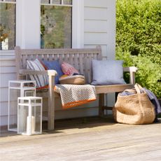 decking area with wooden flooring and wooden chair