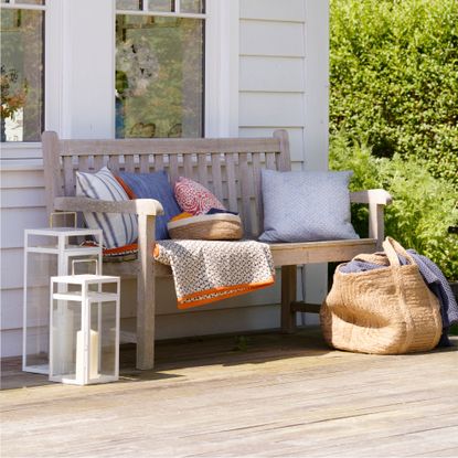 decking area with wooden flooring and wooden chair