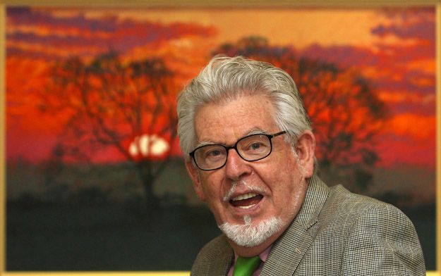 Rolf Harris goes on trial to face 8 charges of alleged 'unwanted