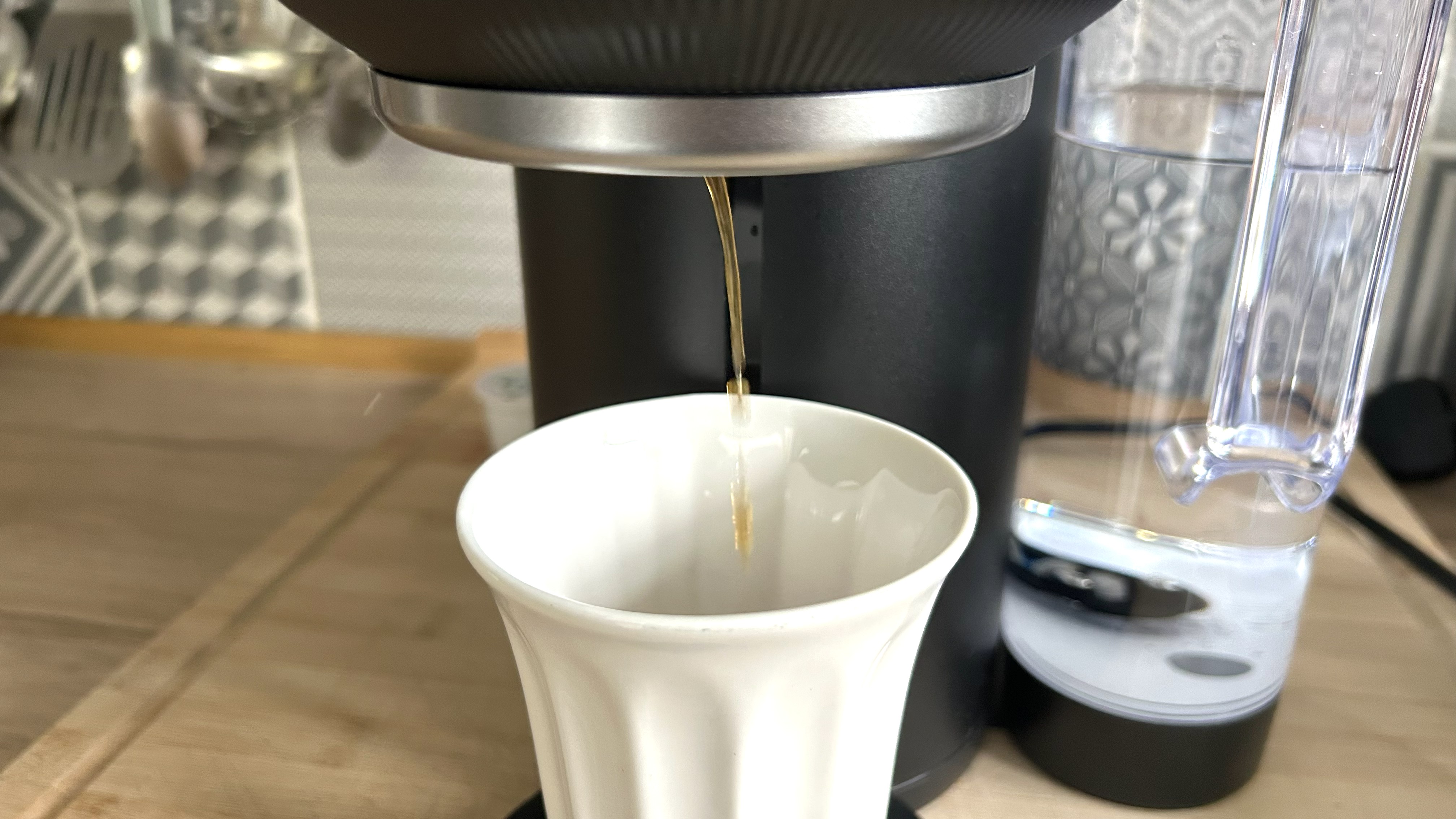 Keurig K-Crema capsule espresso machine dispensing espresso