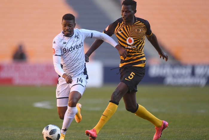 Phathutshedzo Nange of Bidvest Wits challenged by Anthony Agay of Kaizer Chiefs