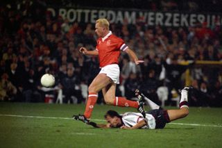 England's David Platt on the ground after being hauled back by Holland's Ronald Koeman