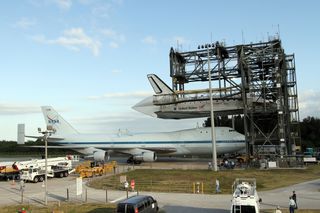 Shuttle Carrier Aircraft Moves Under Discovery