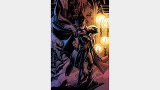 Batman holds Catwoman.