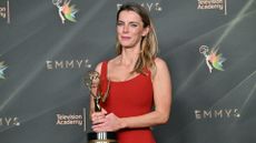 US actress Betty Gilpin winner of Outstanding Guest Actress in a Comedy Series for "Widow's Bay" poses with her Emmy during Night Two of the 78th Emmy Awards at the Peacock Theater in Los Angeles