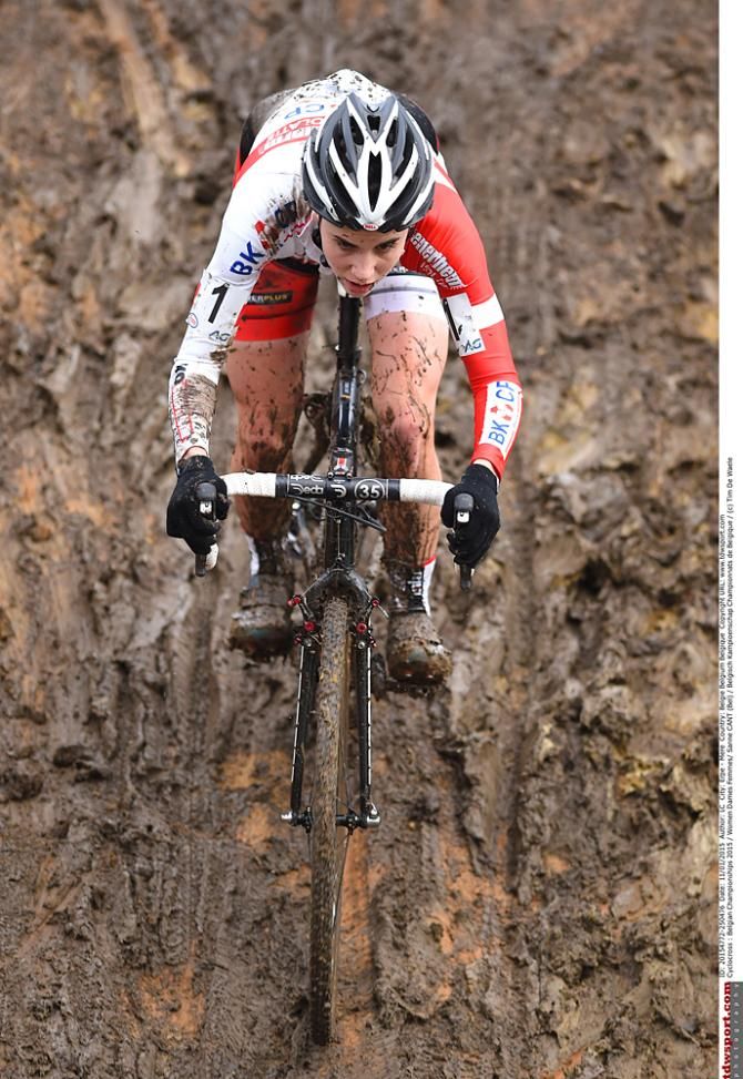 Sanne Cant (Enertherm-BKCP) rides through the thick mud
