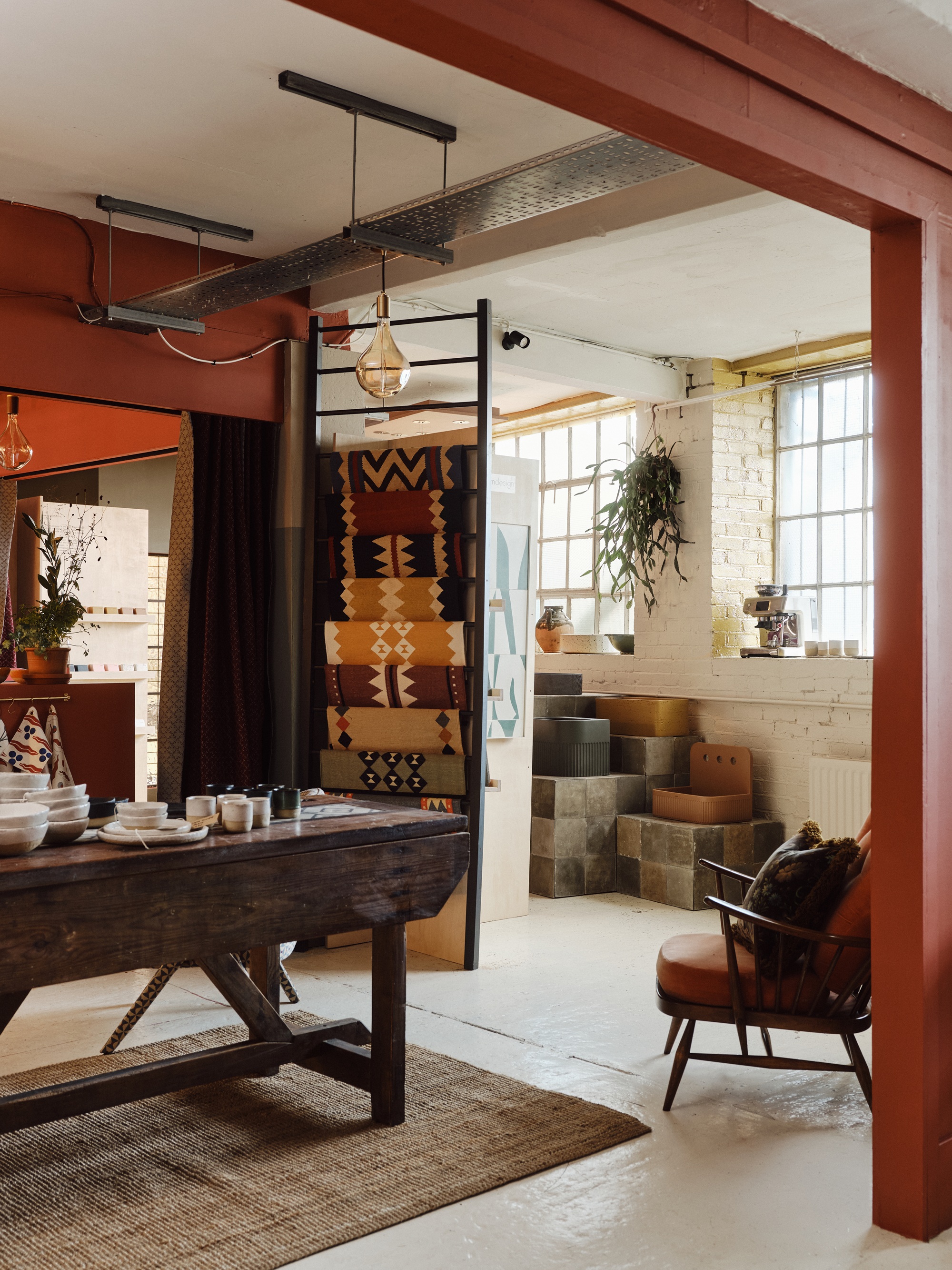 the interiors of the mix by bert and may displaying different brands in an old warehouse