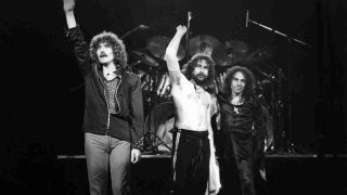 Black Sabbath’s Geezer Butler, Bill Ward and Ronnie James Dio taking their bows onstage in 1980