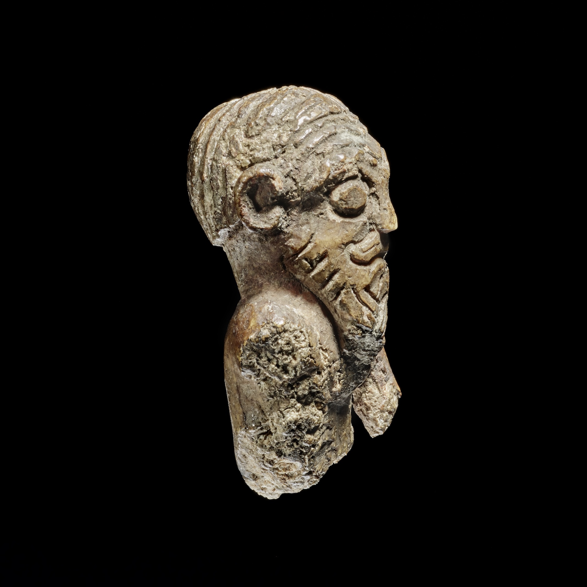 a side view of a Viking figurine