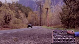 Two Novation Peak synths on a road