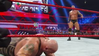 Randy Orton prepares to punt kick Big Show at Extreme Rules 2013