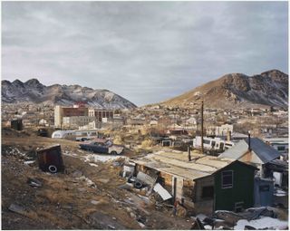 Littered townscape amid mountains