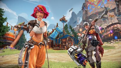 Two hunters smiling in front of some buildings during Horizon Hunters Gathering