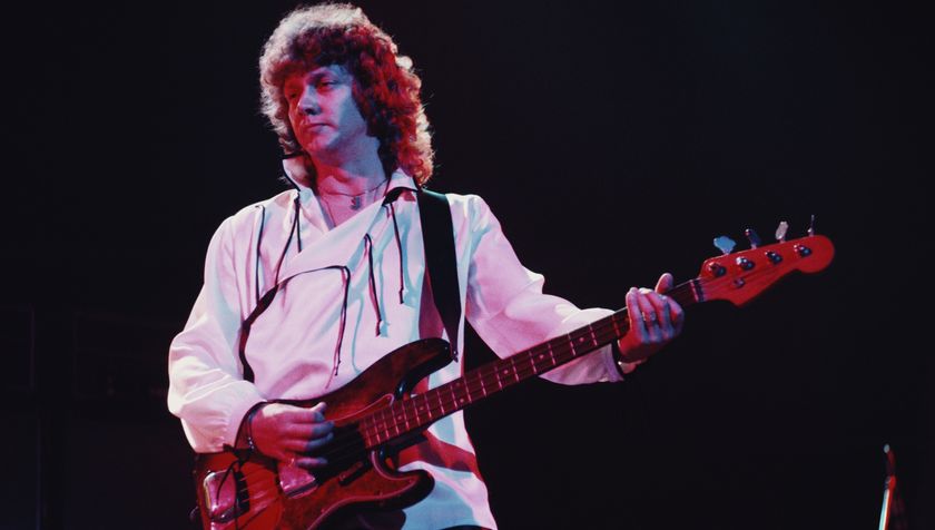 John Lodge performs onstage with the Moody Blues in 1975