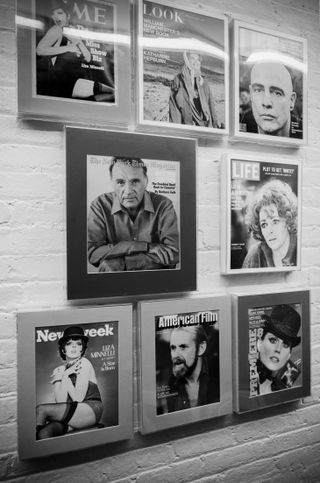 Black and white wall with magazine covers