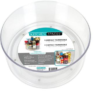 A clear plastic lazy susan turn table with high sides.