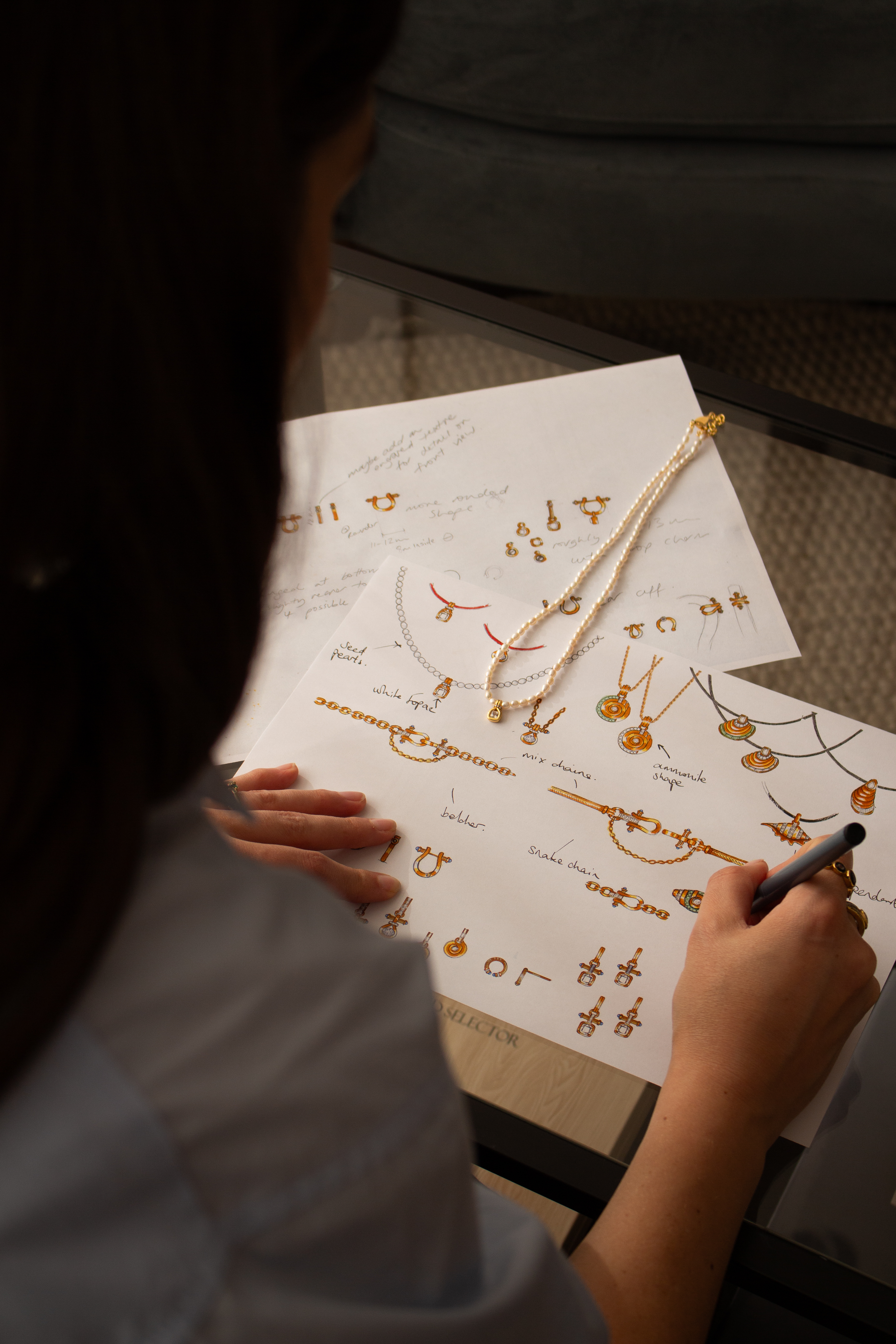laura vann designing jewellery in her office
