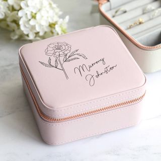 pink jewellery box with white flowers