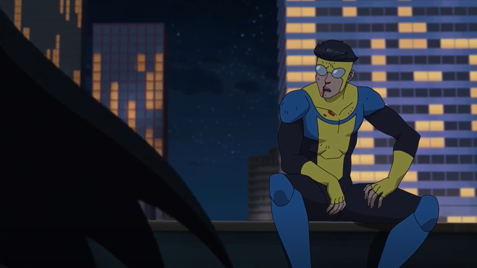 Mark Grayson talks to someone who resembles Batman in Invincible season 2