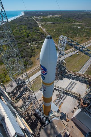 In preparation for launch, the Mobile Service Tower or MST is rolled to its park position at Space Launch Complex-37. ULA's Delta IV rocket is launching the Air Force's ninth Wideband Global SATCOM (WGS-9) satellite.