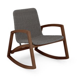 A walnut-armed rocking chair