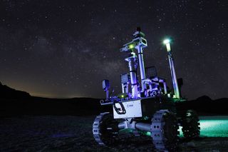 The European Space Agency's Rover Autonomy Testbed, or RAT, takes a test drive at night during testing in the Moon-like environment of Teide National Park of Tenerife in Spain's Canary Islands.
