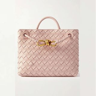 pink quilted leather bag with gold handles