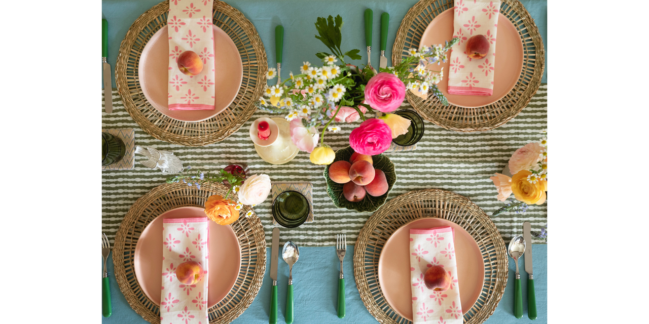 spring table setting with pink, green, and blue décor