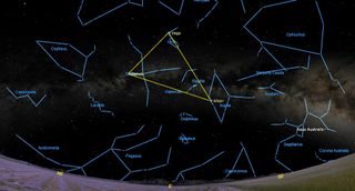 July 22, 2023 at 9:30 pm - The Summer Triangle, Vega, Altair and Deneb, form a triangle in the starry night sky, surrounded by outlined constellations