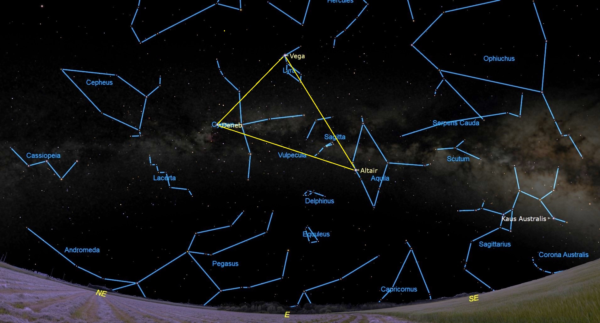 July 22, 2023 at 9:30 pm - The Summer Triangle, Vega, Altair and Deneb, originate a triangle within the starry night sky, surrounded by outlined constellations