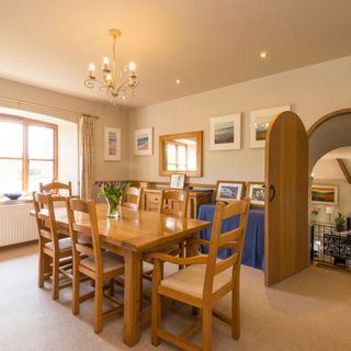 dining room with wooden table and carpet floor