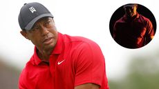 Tiger Woods eyes up a tee shot with his driver