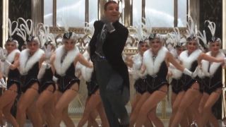 Steve Martin dances in front of a line of chorus girls in Pennies From Heaven